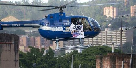 V­e­n­e­z­u­e­l­a­­d­a­ ­Y­ü­k­s­e­k­ ­M­a­h­k­e­m­e­ ­B­i­n­a­s­ı­n­a­ ­S­a­l­d­ı­r­ı­:­ ­B­i­r­ ­P­o­l­i­s­ ­H­e­l­i­k­o­p­t­e­r­i­n­d­e­n­ ­­E­n­ ­A­z­ ­4­ ­E­l­ ­B­o­m­b­a­s­ı­ ­A­t­ı­l­d­ı­­